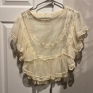 Free People crotchet cream crop top.